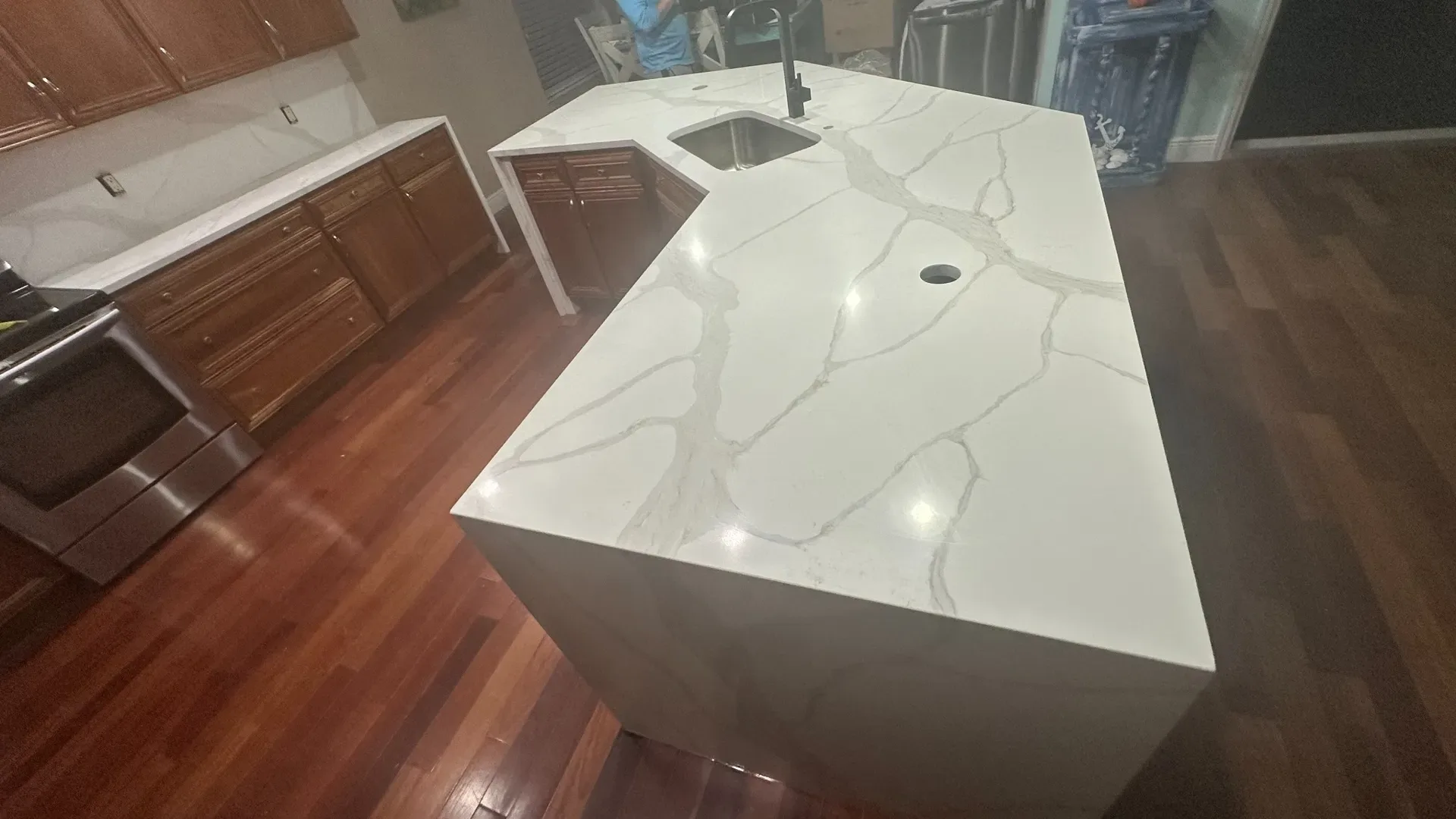Quartz waterfall countertop installation